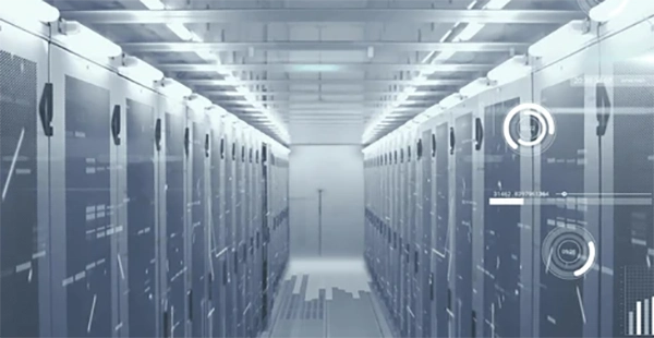 A server room aisle with a wall calendar visible in the foreground, several dates circled